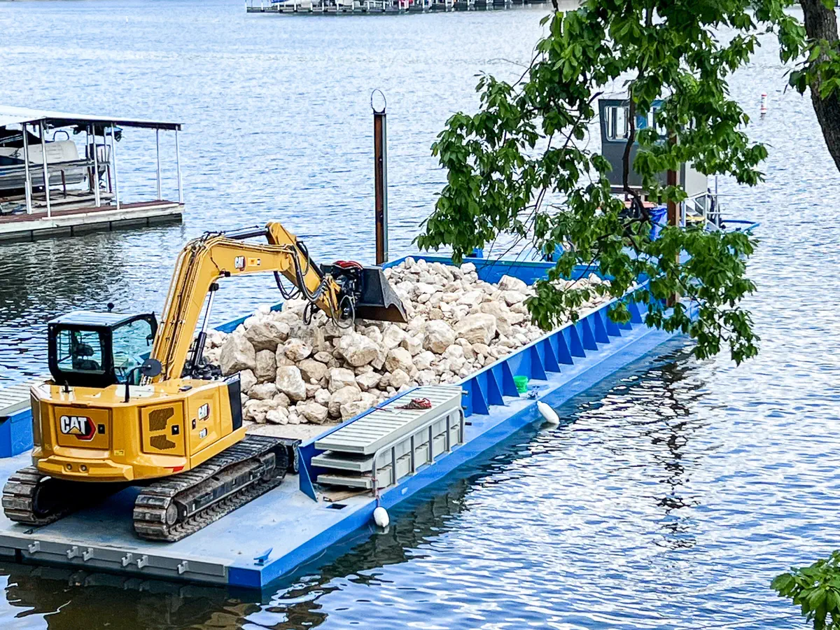 Work barge supporting marine construction