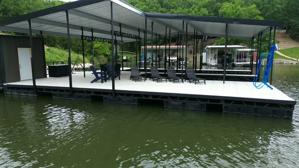 Covered dock with a shaded seating area