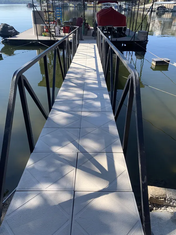 Aluminum gangway leading out to a boat dock
