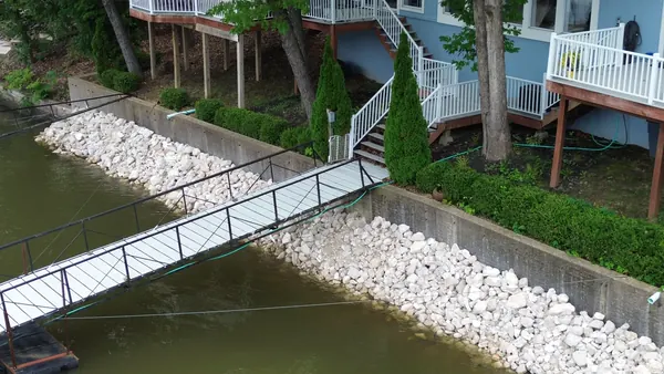 Seawall, rock toe and stairs at a lake home